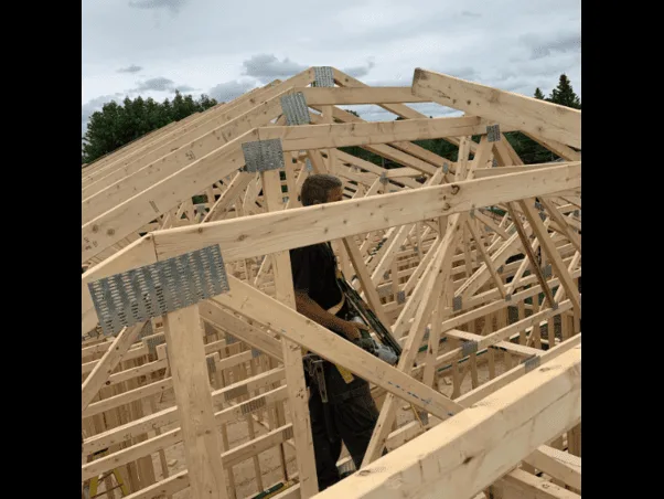 The timber structure of a residential roof during construction